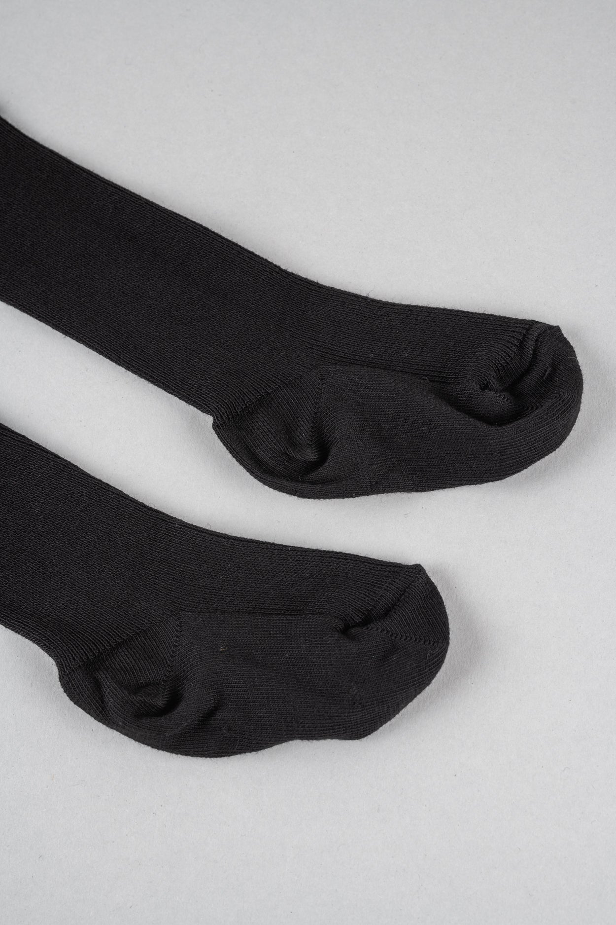 Strumpfhose mit Hosenträgern in schwarz